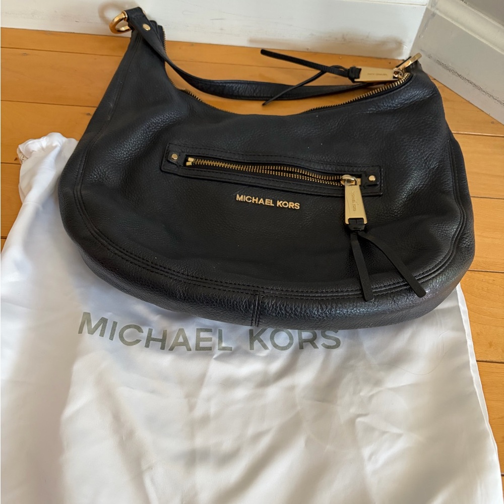 Michael Kors Black Hobo Bag with Gold Accents